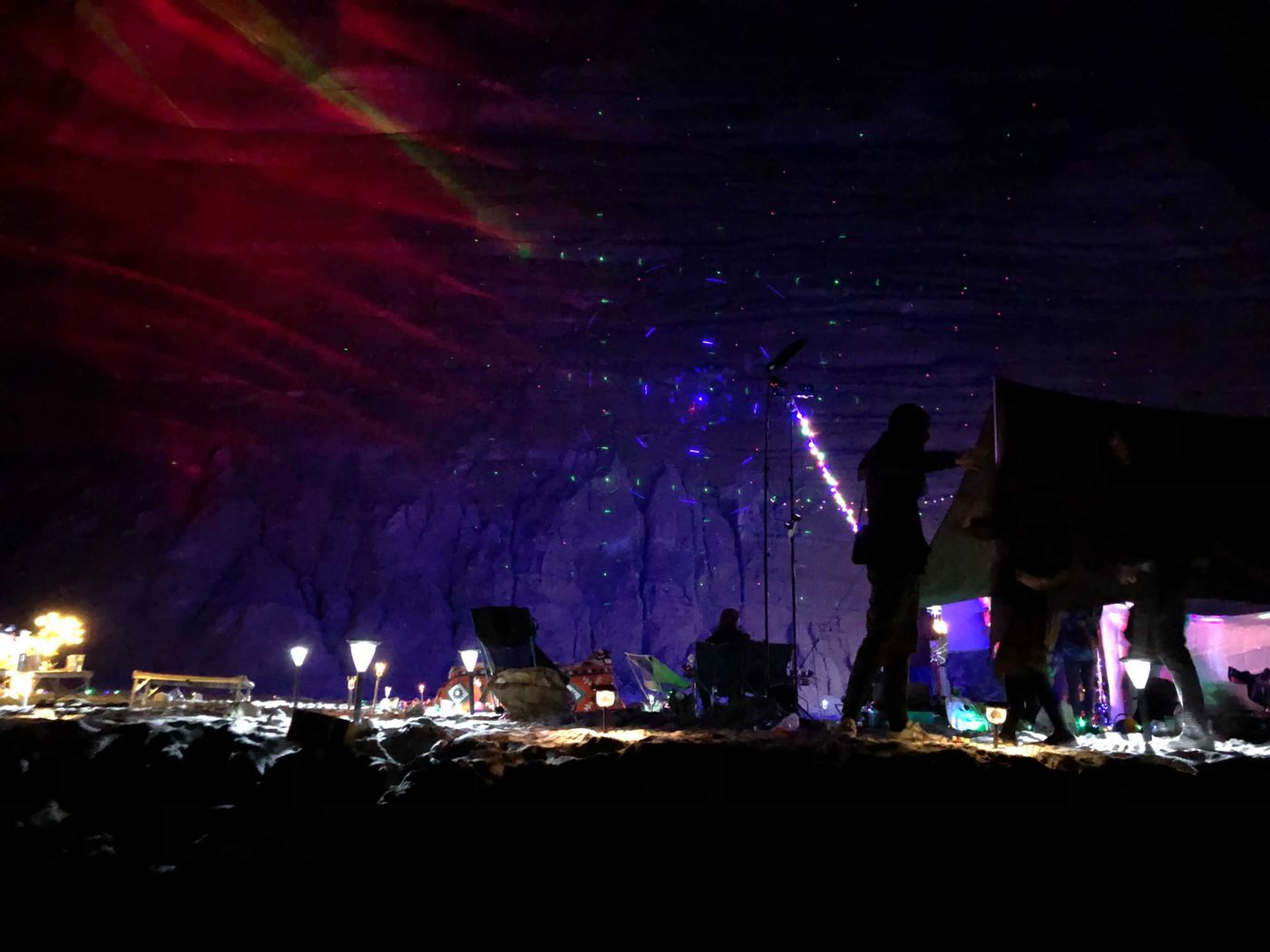 The stage glowing under the stars
