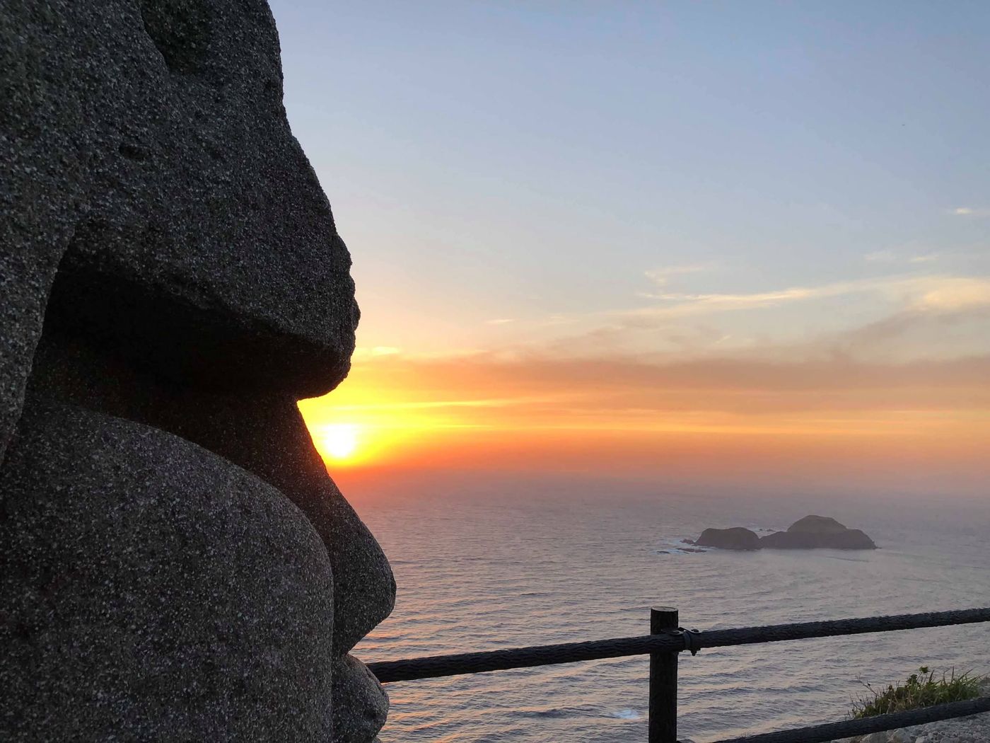 Sunset through a rock window