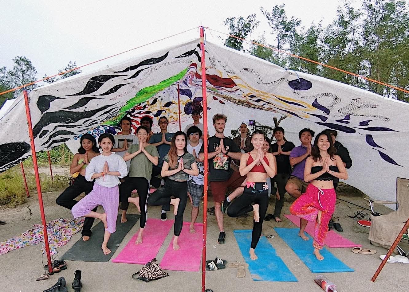 Morning yoga under the painted canopy
