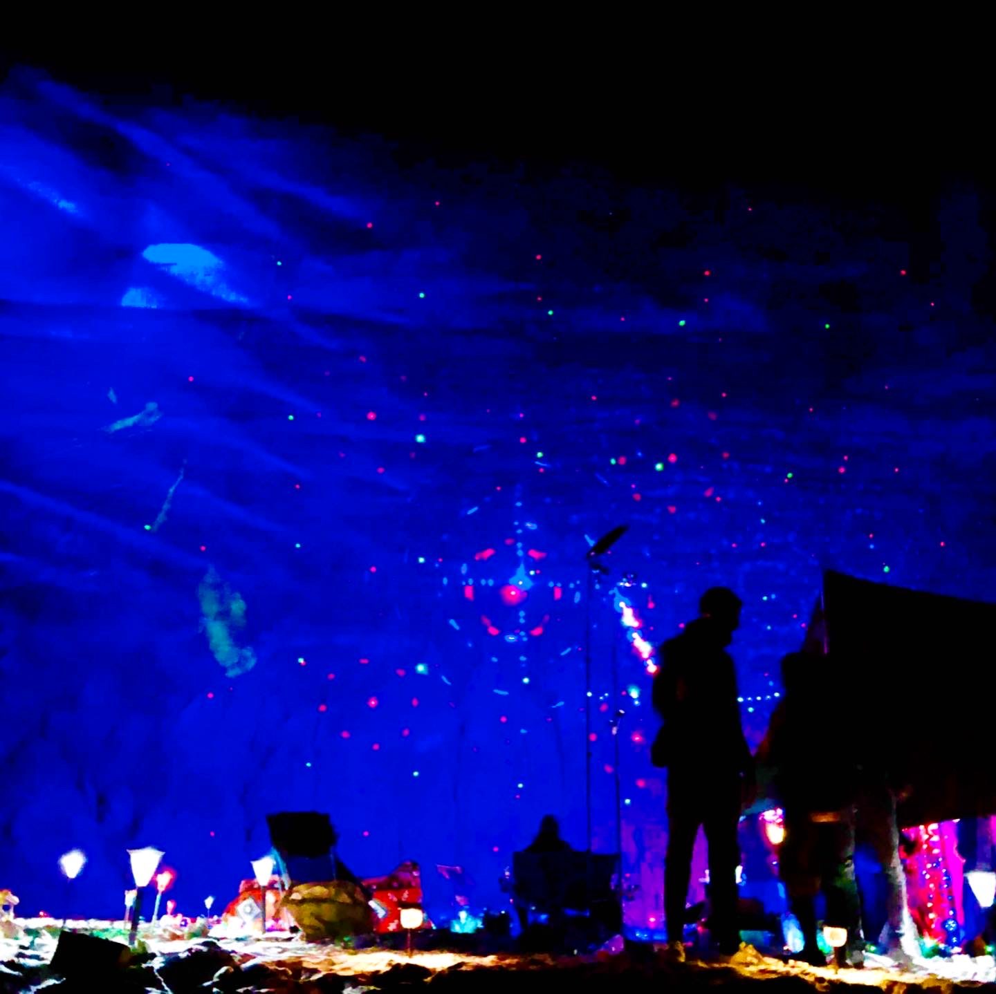 Blue night sky over the crowd